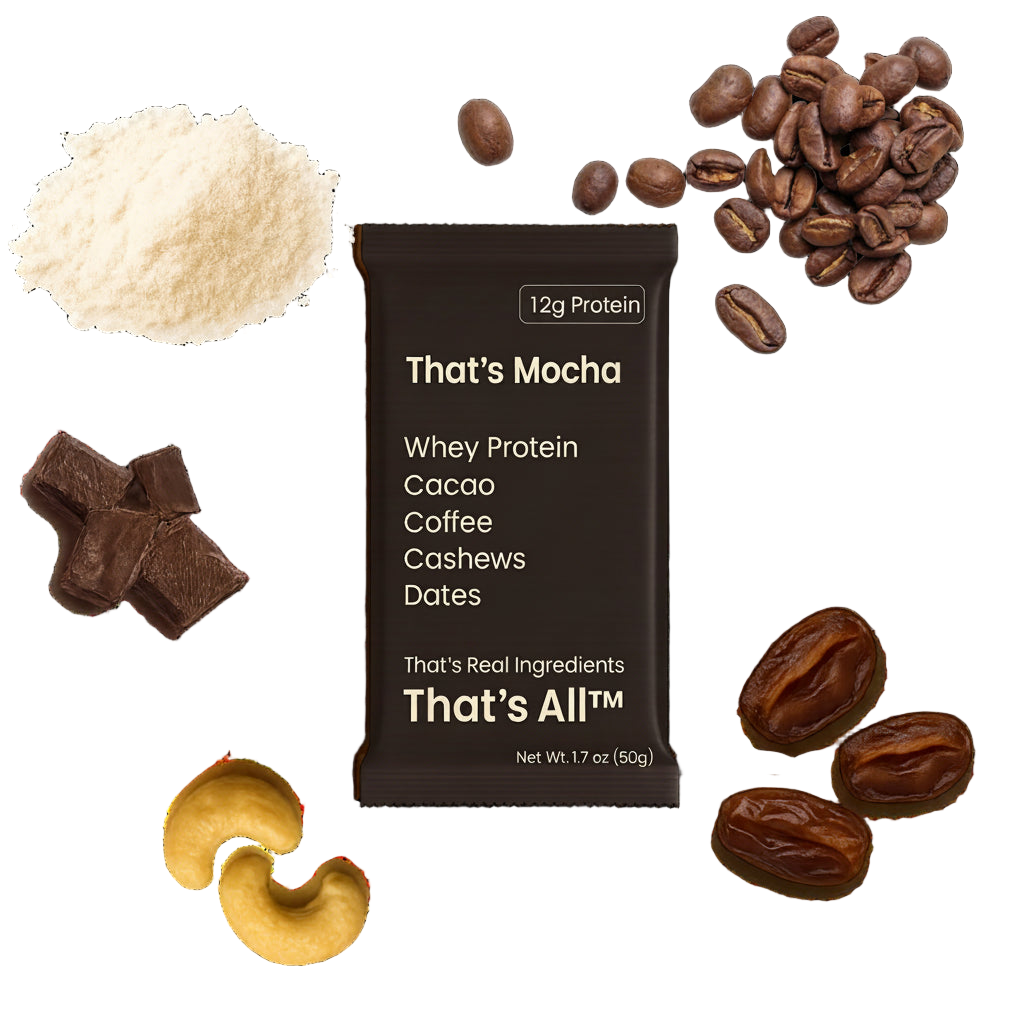 Thats Mocha - Whey protein bar with mocha flavor surrounded by coffee beans, cashews, and dates on a white background.