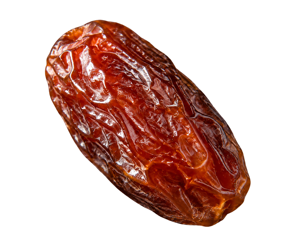 A single dried date, showing its characteristic wrinkled texture and deep reddish-brown color, isolated on a solid white background.