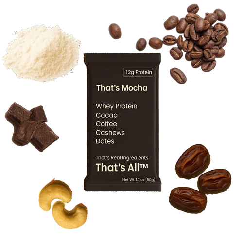 Thats Mocha - Whey protein bar with mocha flavor surrounded by coffee beans, cashews, and dates on a white background.