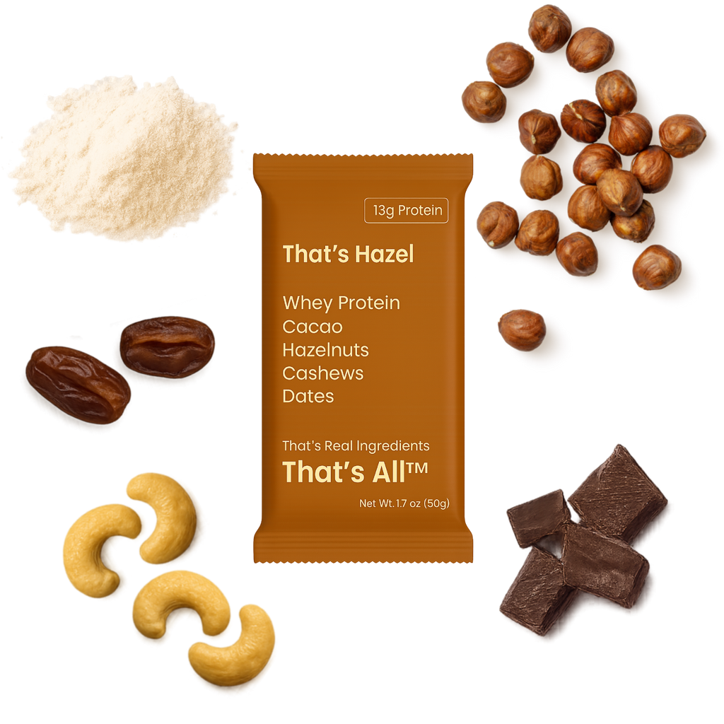 Thats Hazel -Whey protein package with cacao, hazelnuts, cashews, and dates on a white background